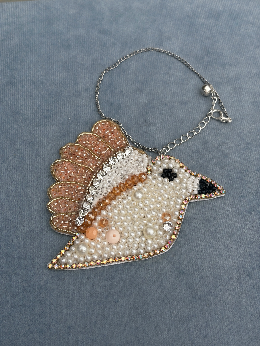 Pearl Swan Charm Rakhi